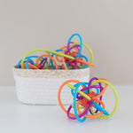 Manhattan Toy Winkel Rattle & Sensory Teether: Classic Baby Toy for Clutching and Auditory Stimulation