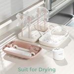 Momcozy 7-in-1 Baby Bottle Brush Set with Drying Rack, Pink | Silicone Nipple Straw Brushes, Soap Dispenser Storage Box, Foldable Drain Rack, Portable Bag, BPA-Free, Home & Travel