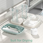 Momcozy 7-in-1 Baby Bottle Brush Set with Drying Rack, Green | Silicone Nipple Straw Brushes, Soap Dispenser Storage Box, Foldable Drain Rack, Portable Bag, BPA-Free, Home & Travel