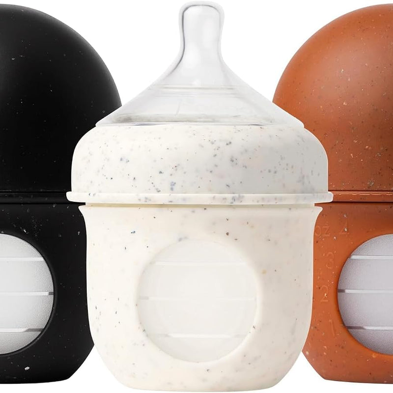 Boon Nursh Bottles - Slow Flow - Silicone Baby Bottles Help Ease Colic Symptoms - Formula and Breast Milk Only Touch Platinum Food-Safe Silicone - Pink - 0-3 Months - 3 Count - 4 Ounce