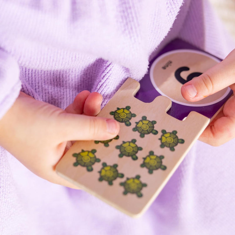 Melissa & Doug Self-Correcting Wooden Number Puzzles with 40 Durable Pieces, Designed for Preschoolers Ages 4-7, Featuring Familiar Objects and a Convenient Slide-In Storage Box for Early Learning and Skill Development.