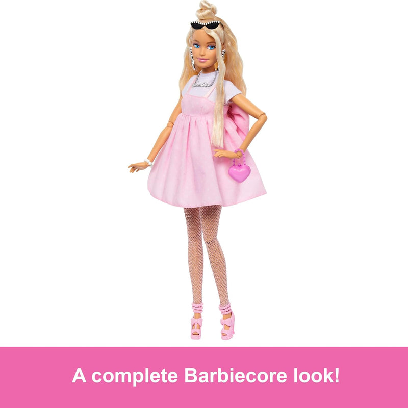 Barbie Deluxe Style Doll #3 in Barbiecore Outfit, Blond Hair in Top Knot, Pink Pastel Dress with Oversized Bow and Accessories Like Mesh Tights​​​