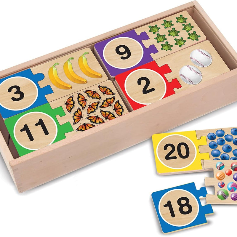 Melissa & Doug Self-Correcting Wooden Number Puzzles with 40 Durable Pieces, Designed for Preschoolers Ages 4-7, Featuring Familiar Objects and a Convenient Slide-In Storage Box for Early Learning and Skill Development.