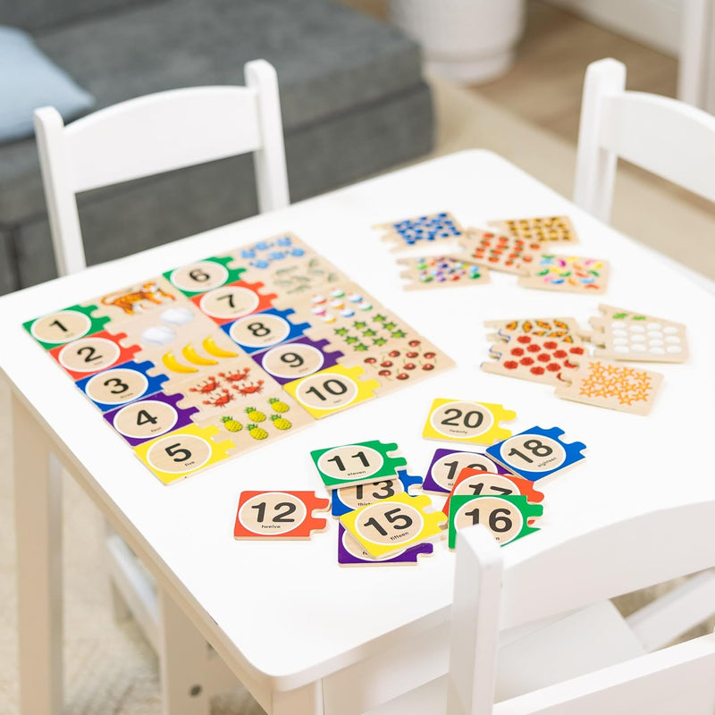Melissa & Doug Self-Correcting Wooden Number Puzzles with 40 Durable Pieces, Designed for Preschoolers Ages 4-7, Featuring Familiar Objects and a Convenient Slide-In Storage Box for Early Learning and Skill Development.