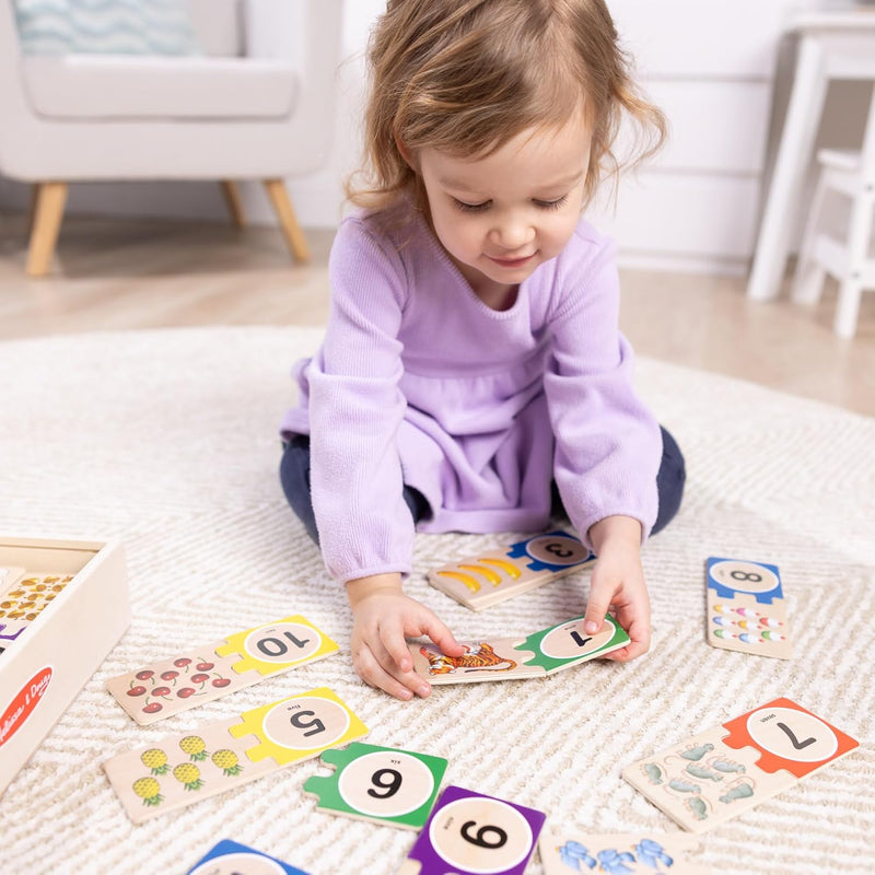 Melissa & Doug Self-Correcting Wooden Number Puzzles with 40 Durable Pieces, Designed for Preschoolers Ages 4-7, Featuring Familiar Objects and a Convenient Slide-In Storage Box for Early Learning and Skill Development.