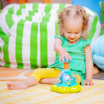 Bright Starts Press & Glow Spinner Cause and Effect Musical Baby Toy, Age 6 Months+