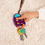 B. toys Toy Car FunKeys with Lights and Sounds, Purple, Pretend Play | 3 textured plus a driver’s key with push-button flashlight and 4 sounds for pretend play, Purple, Interactive, 10+ Months