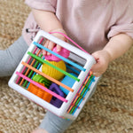 Fat Brain Toys InnyBin Shape Learning Sensory Toy | Grasping and shape-learning activity. Fine motor skills, sensory learning, spatial reasoning. Babies, toddlers, 10 months+.