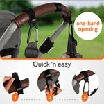 Baby Uma Stroller Hooks for Bags (2 Pack) - Non-Slip, One-Hand Use, 11 lb | These universal stroller clips open one-handed, resist slipping, and each carabiner hook holds 11 lbs—a travel essential.